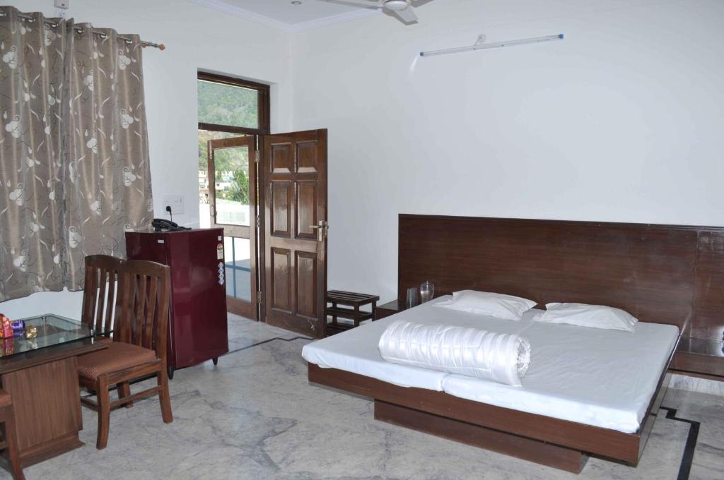 Hotel Shivanta Residency Rišikéš Pokoj fotografie